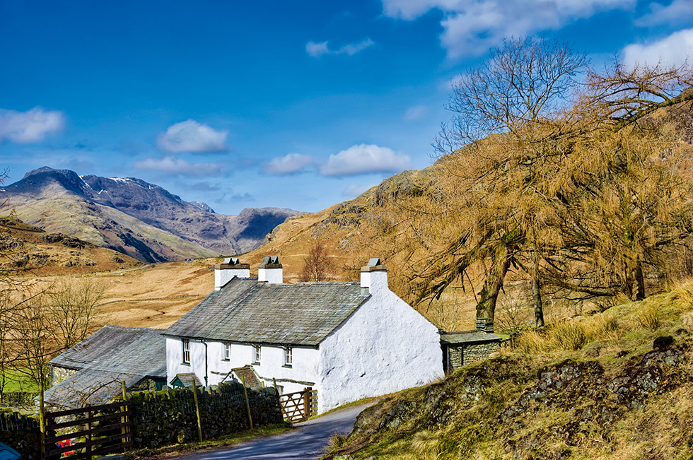 a typical Lake District region home with whitewashed stone walls