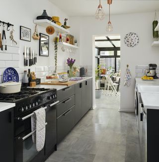 Black Ikea kitchen with open shelving