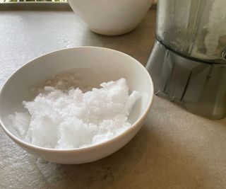 A bowl of crushed ice made in the Nama C2 Blender and Juicer