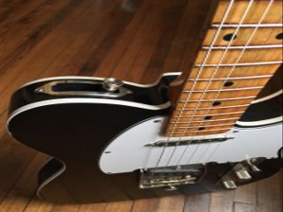 The strap lever extension on Damian Fanelli's Parsons/White StringBender-equipped Palir Titan (with Lollar pickups and an Emerson four-way swtich).