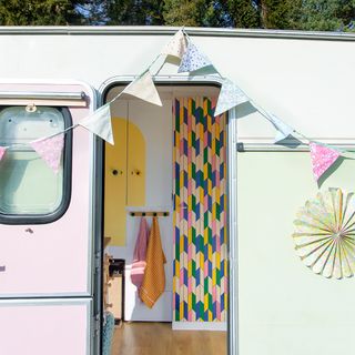Caravan makeover with door area and bunting