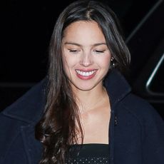 Olivia Rodrigo styled a D&ouml;en jacket with straight-leg jeans, a striped sweater, and Repetto ballet flats