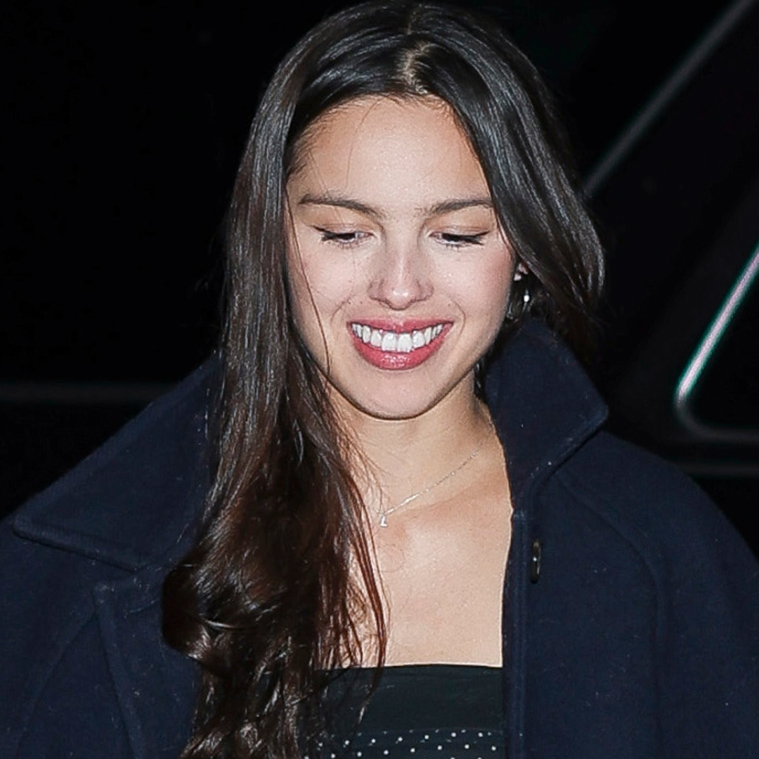 Olivia Rodrigo styled a D&ouml;en jacket with straight-leg jeans, a striped sweater, and Repetto ballet flats