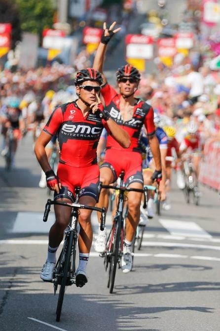 Greg Van Avermaet (BMC) wins and teammate Daniel Oss celebrates in Bastogne