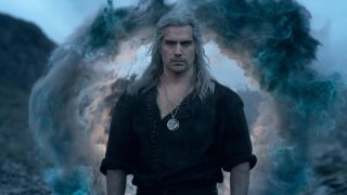 Henry Cavill stoically steps through a portal in The Witcher.