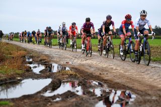 ROUBAIX FRANCE OCTOBER 02 LR Chantal Van Den Broek Blaak of Netherlands and Team SD Worx and Jeanne Korevaar of Netherlands and Team Liv Racing compete through cobblestones sector during the 1st ParisRoubaix 2021 Womens Elite a 1164km race from Denain to Roubaix ParisRoubaixFemmes ParisRoubaix on October 02 2021 in Roubaix France Photo by Tim de WaeleGetty Images