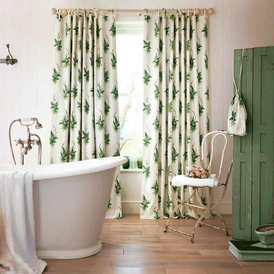 bathroom with floral curtain and sack