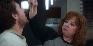 Melissa McCarthy feeding Jason Bateman raw chicken in Netflix's Thunder Force