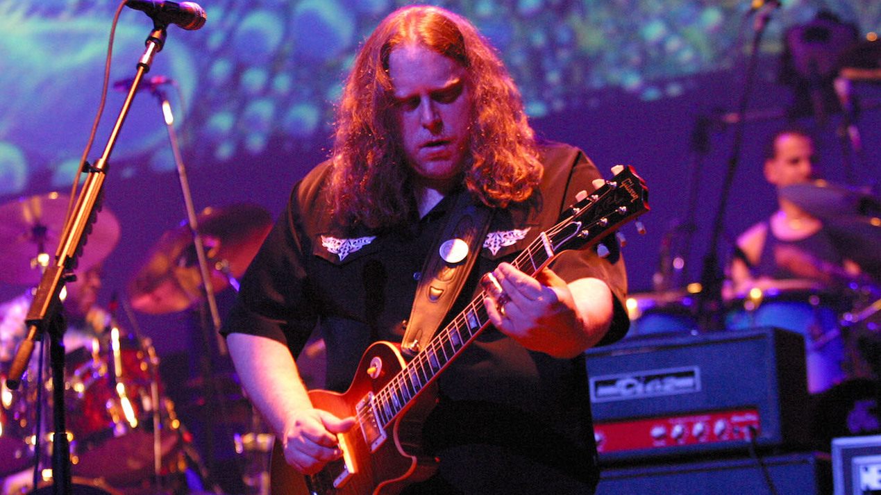 Warren Haynes playing guitar onstage