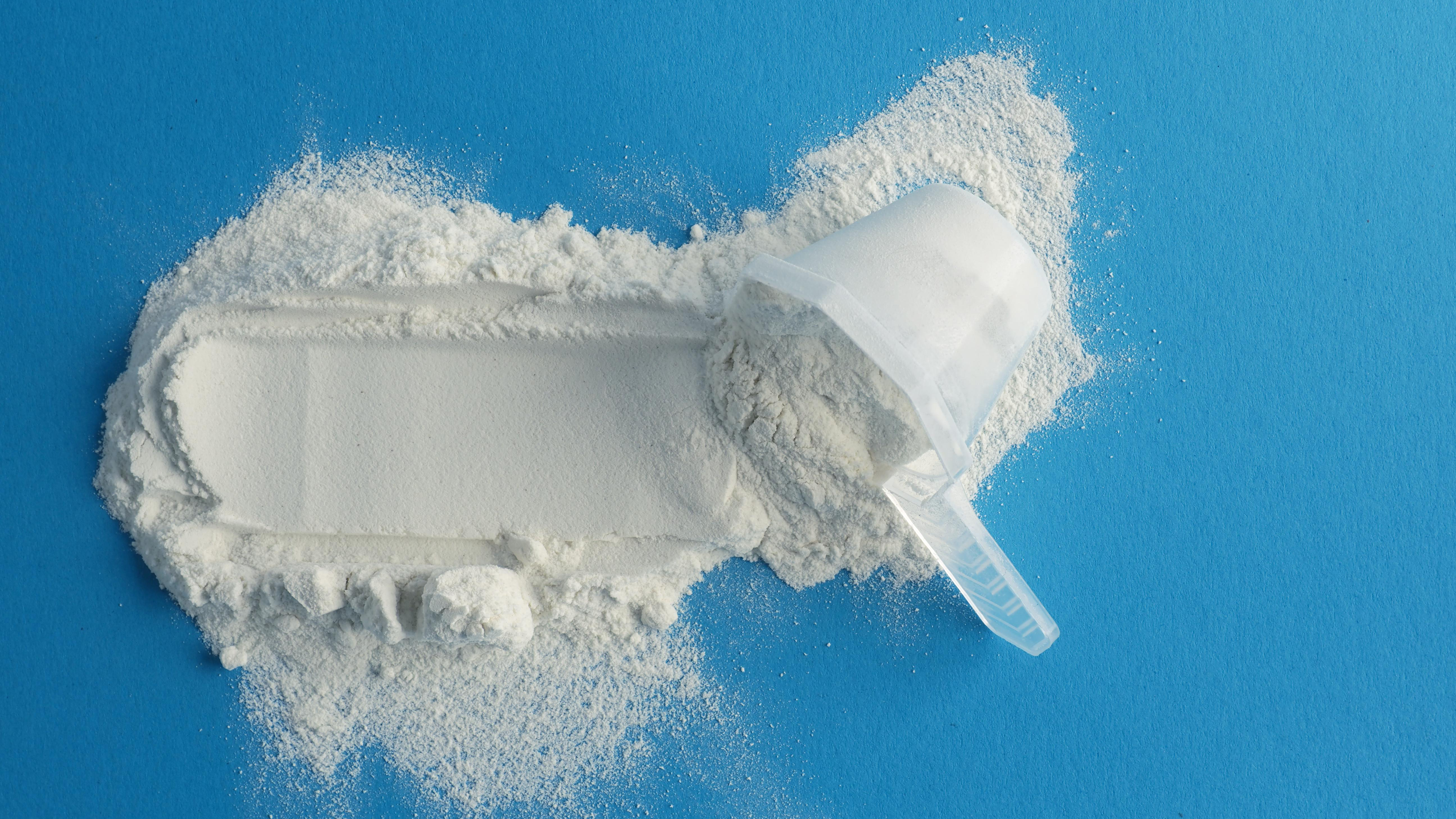 A supplement powder and scoop