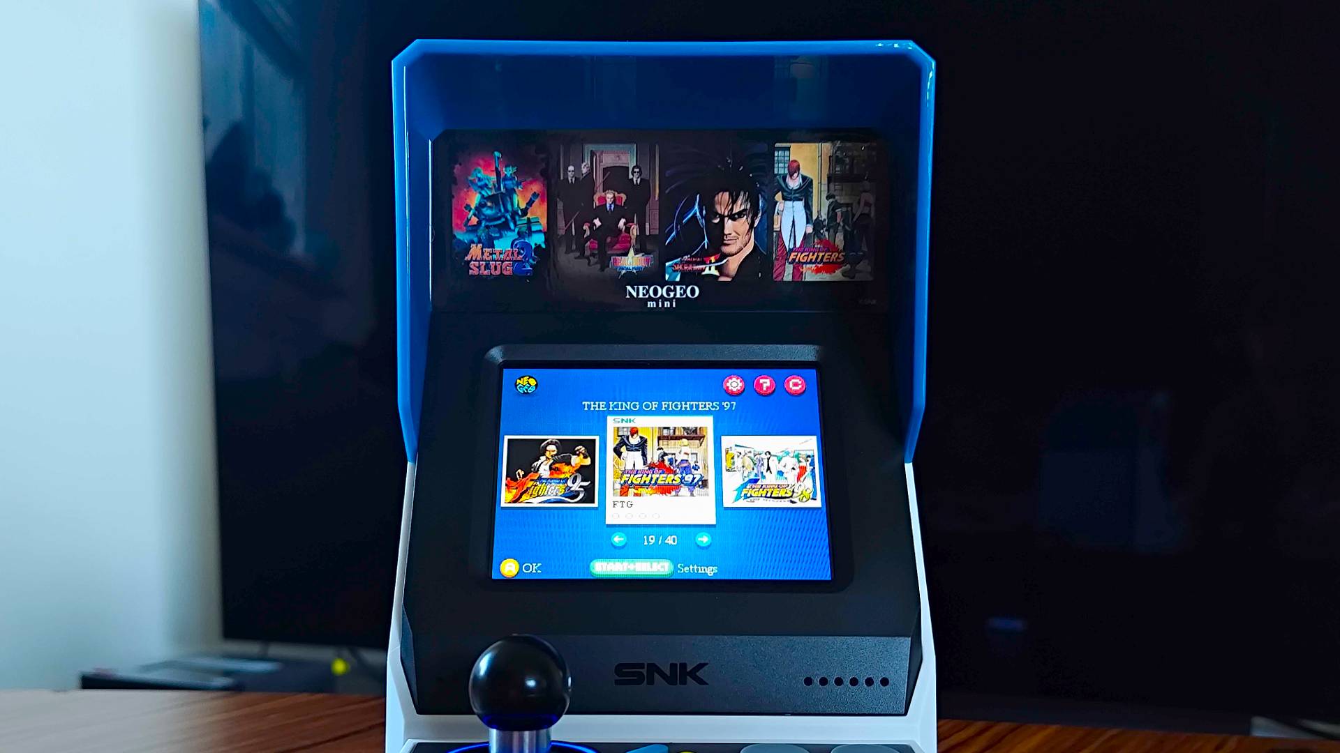 Close up of Neo Geo Mini screen with game menu displayed.