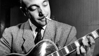 Django REINHARDT (1910-1953) playing his guitar backstage in New York in 1946.