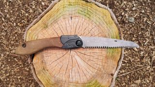 Silky PocketBoy 170 Outback Edition camping saw on log