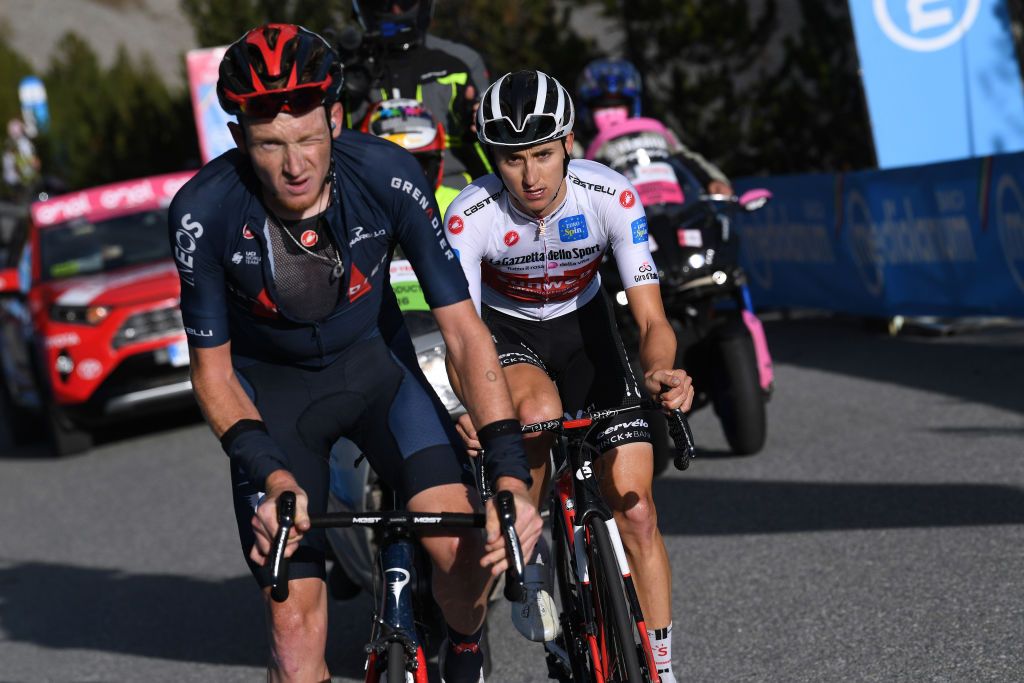 LAGHI DI CANCANO ITALY OCTOBER 22 Tao Geoghegan Hart of The United Kingdom and Team INEOS Grenadiers Jai Hindley of Australia and Team Sunweb White Best Young Rider Jersey Torri di Fraele 1938m during the 103rd Giro dItalia 2020 Stage 18 a 207km stage from Pinzolo to Laghi di Cancano Parco Nazionale dello Stelvio 1945m girodiitalia Giro on October 22 2020 in Laghi di Cancano Italy Photo by Tim de WaeleGetty Images