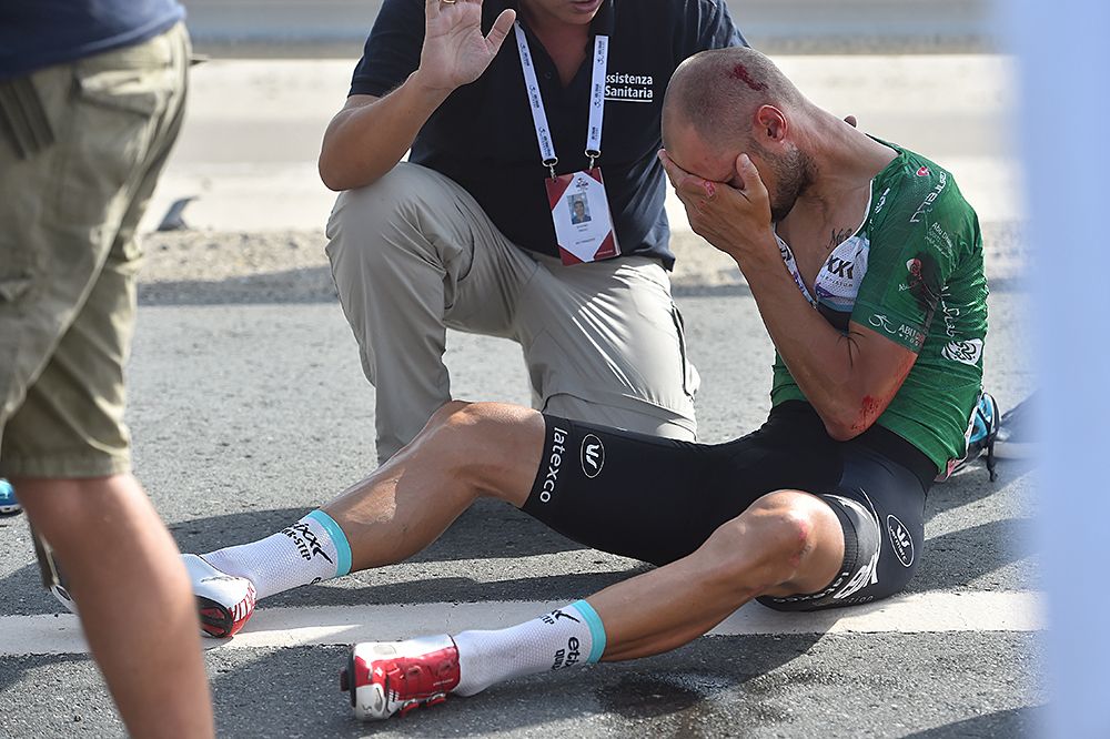 Tom Boonen (Etixx-QuickStep) holding his head after crashing at Abu Dhabi Tour