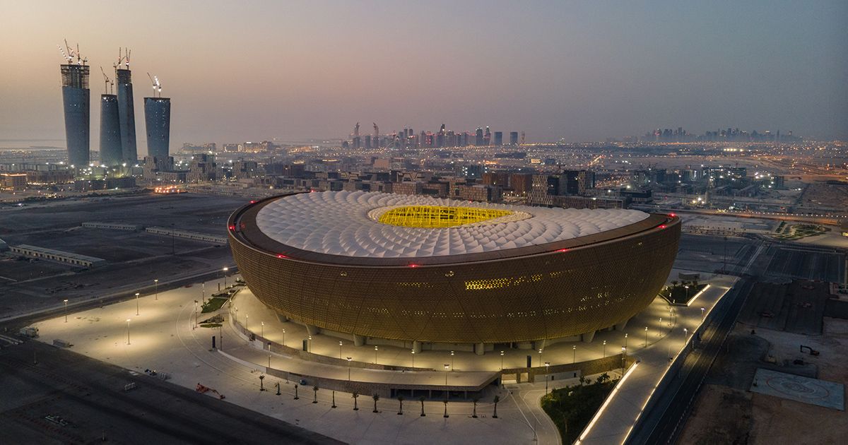 An aerial view of Lusail Stadium at sunrise on June 20, 2022 in Doha, Qatar. The 80,000-seat stadium, designed by Foster + Partners studio, will host the final game of the FIFA World Cup Qatar 2022 starting in November.