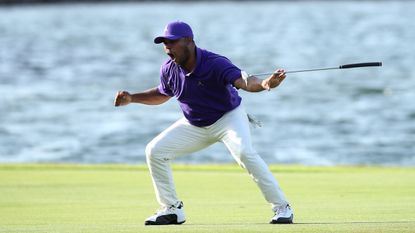 Harold Varner III celebrates