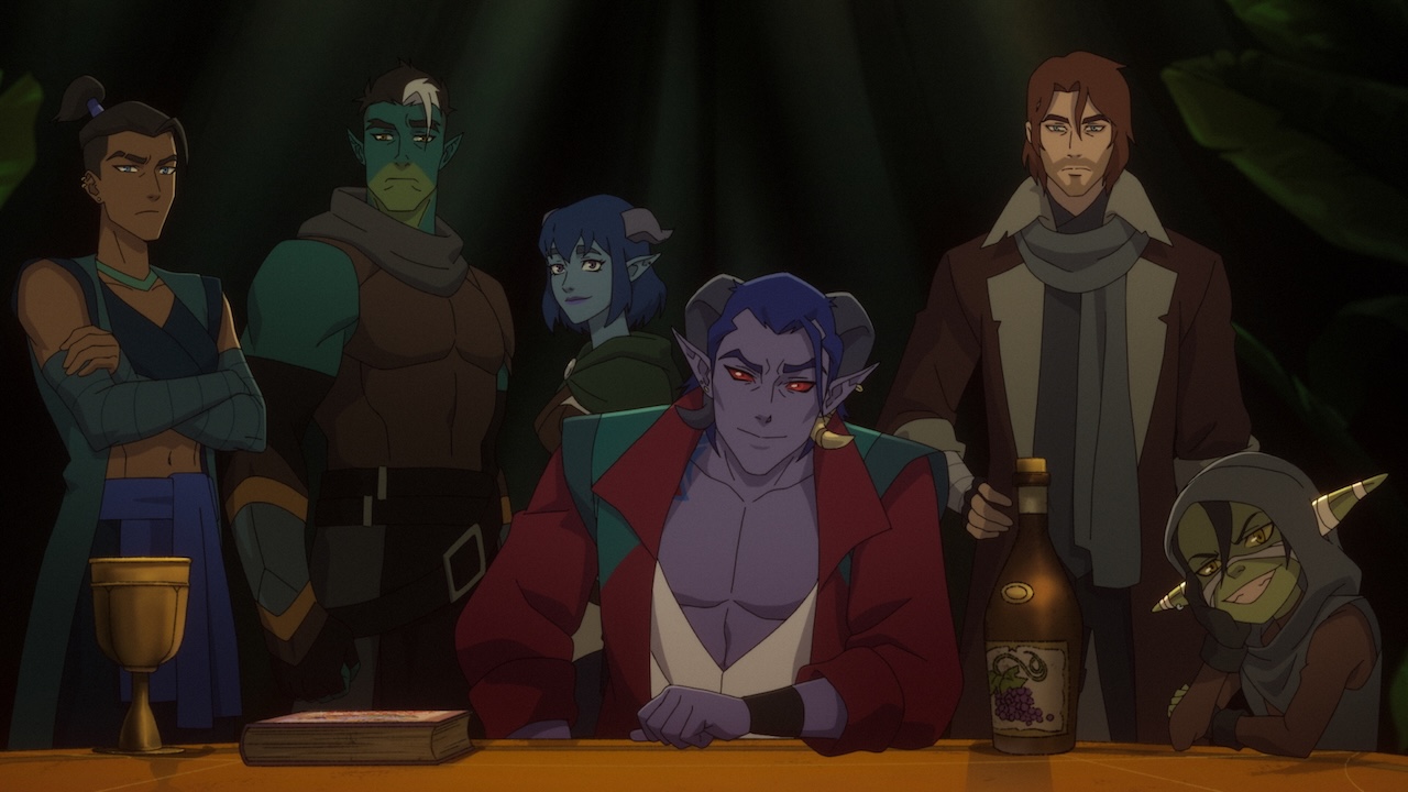 The Mighty Nein as a group at a table in Season 1