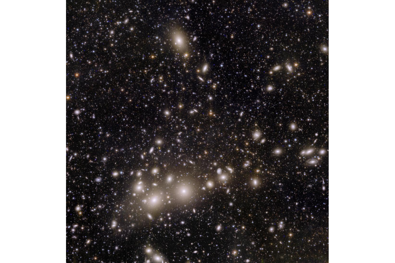 Una imagen de muchas estrellas y galaxias en el espacio.