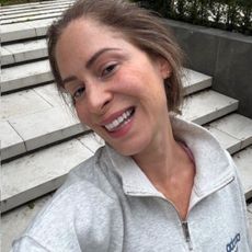 A woman trying rebounding: Doing the splits in the air