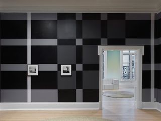 grey striped interior with artwork