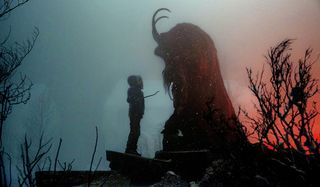 Krampus movie girl in front of monster