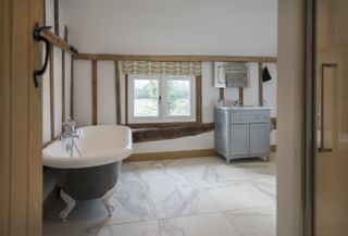 bathroom with authentic casement window from Residence 9