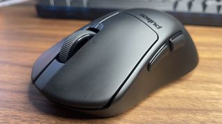 A Pulsar X3 CrazyLight Mini gaming mouse.