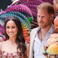 Meghan, Duchess of Sussex and Prince Harry, Duke of Sussex pose for a photo at Centro Nacional de las Artes Delia Zapata during a visit to Colombia on August 15, 2024 in Bogota, Colombia.