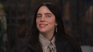 Billie Eilish smiling during CBS Sunday Morning interview from December 2024
