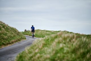 Male cyclist training towards going faster on a century ride
