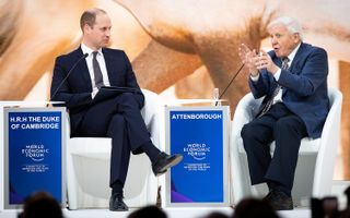 Prince William talks with British naturalist Sir David Attenborough during a plenary session during the 49th annual meeting of the World Economic Forum, in Davos, Switzerland, on Jan. 22, 2019.