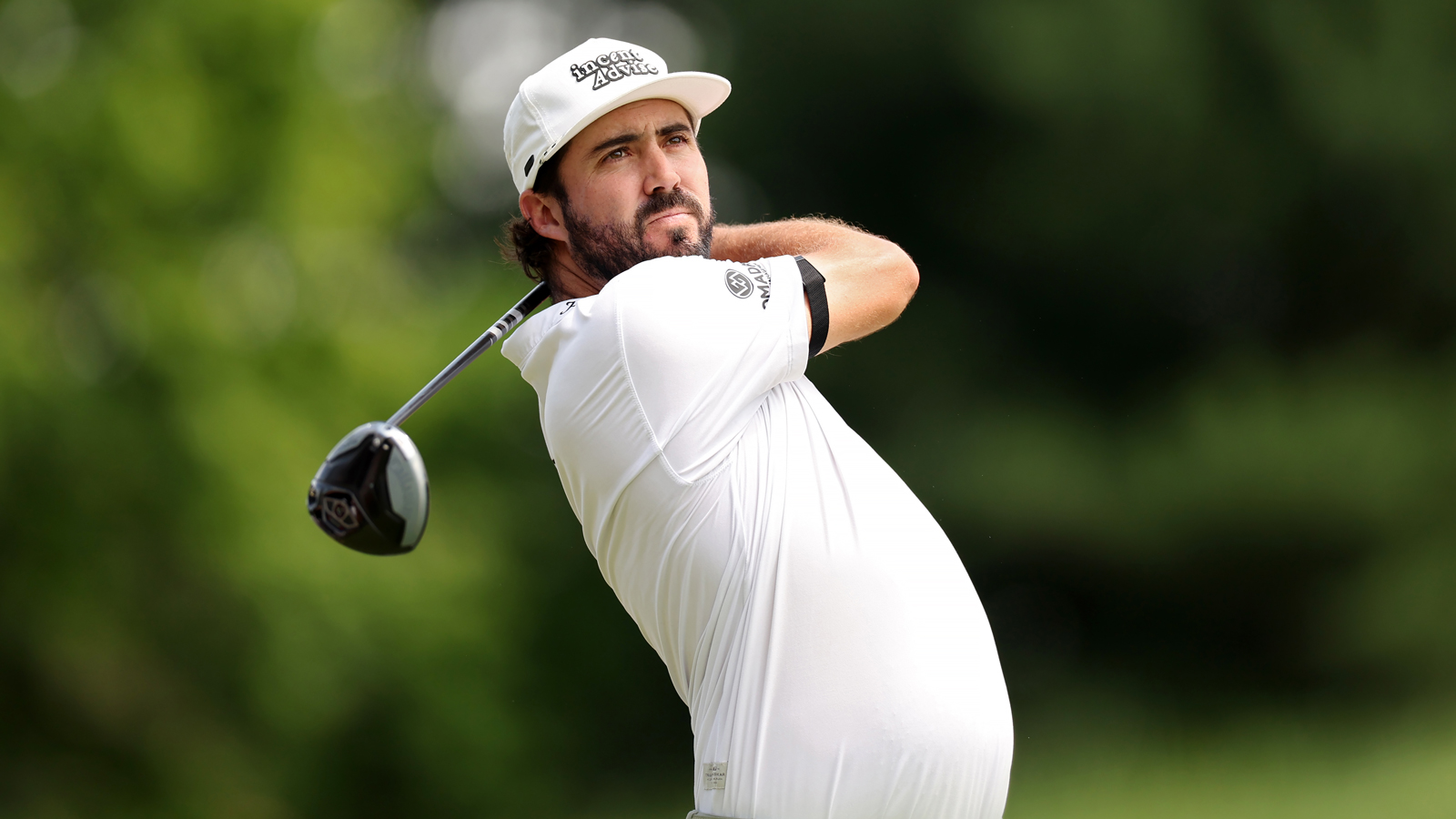 Mark Hubbard hits a driver off the tee