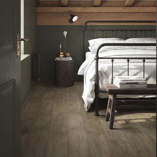 bedroom with wooden flooring