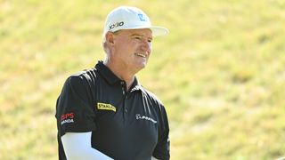 Ernie Els watches a shot at the Sanford International