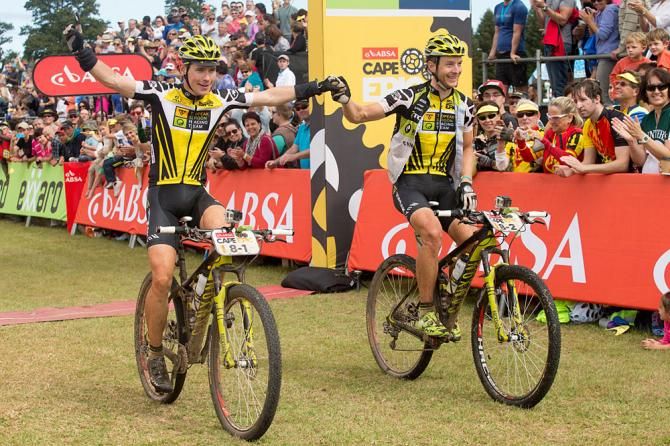 Robert Mennen (left) and Kristian Hynek of team Topeak Ergon celebrating winning the 2014 Cape Epic