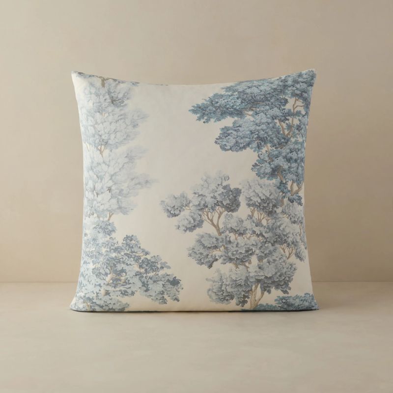 powder blue and white botanical-print cushion