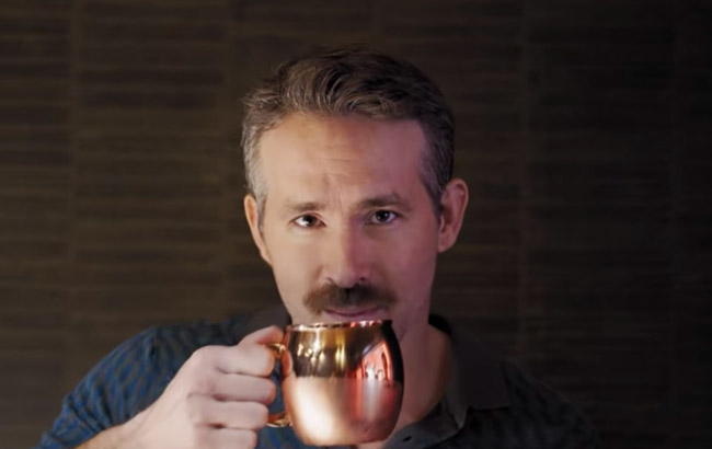 Ryan Reynolds takes aim at Henry Cavill in Movember-inspired gin ad
