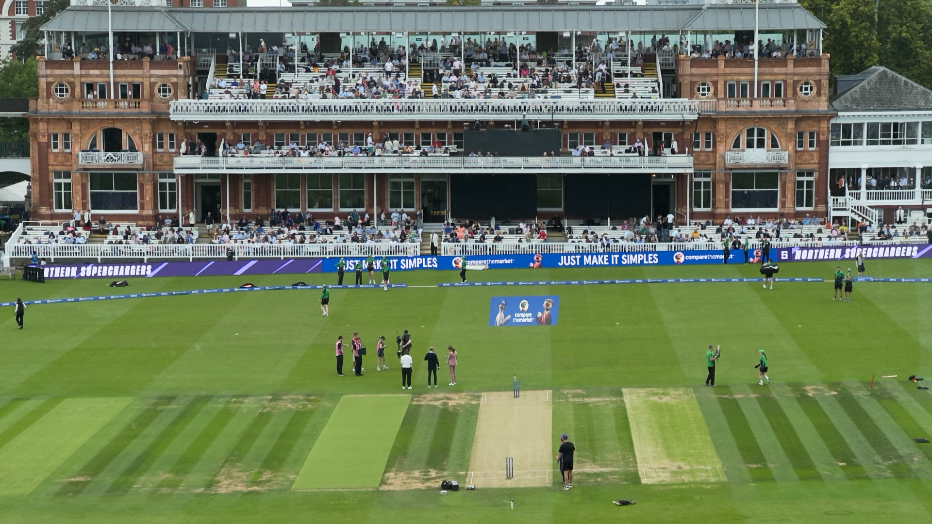 Lord&#039;s cricket ground ahead of The Hundred finals on 31 August, 2025. Players and umpires on the ground preparing for the game.