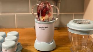 Nutribullet Baby blender filled with bananas and berries