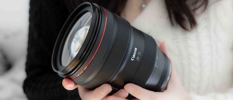 Canon RF 28-70mm f/2L USM Lens in the hands of the author