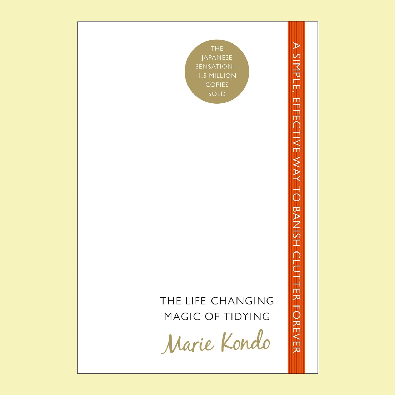 A white paperback book titled 'The Life-Changing Magic of Tidying' by Marie Kondo