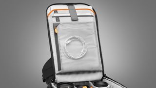 The Lowepro Flipside Backpack 400 AW III on a grey background