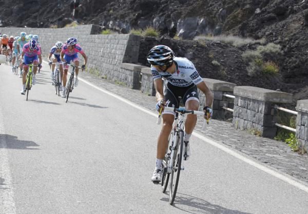 Alberto Contador (Saxo Bank) check on Michele Scarponi (Lampre)