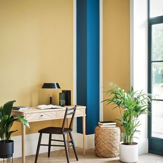 Yellow and blue stripe home office with desk