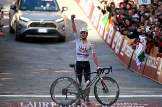 SIENA ITALY MARCH 02 Tadej Pogacar of Slovenia and UAE Team Emirates celebrates at finish line as race winner during the 18th Strade Bianche 2024 Mens Elite a 215km one day race from Siena to Siena 320m UCIWT on March 02 2024 in Siena Italy Photo by Tim de WaeleGetty Images