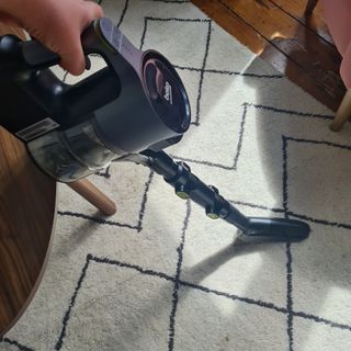 Beko Powerclean VRT94929VI Cordless Vacuum Cleaner soft brush tool being used on a rug