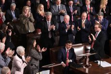 Mike Johnson (R-LA) surrounded by House Republicans 