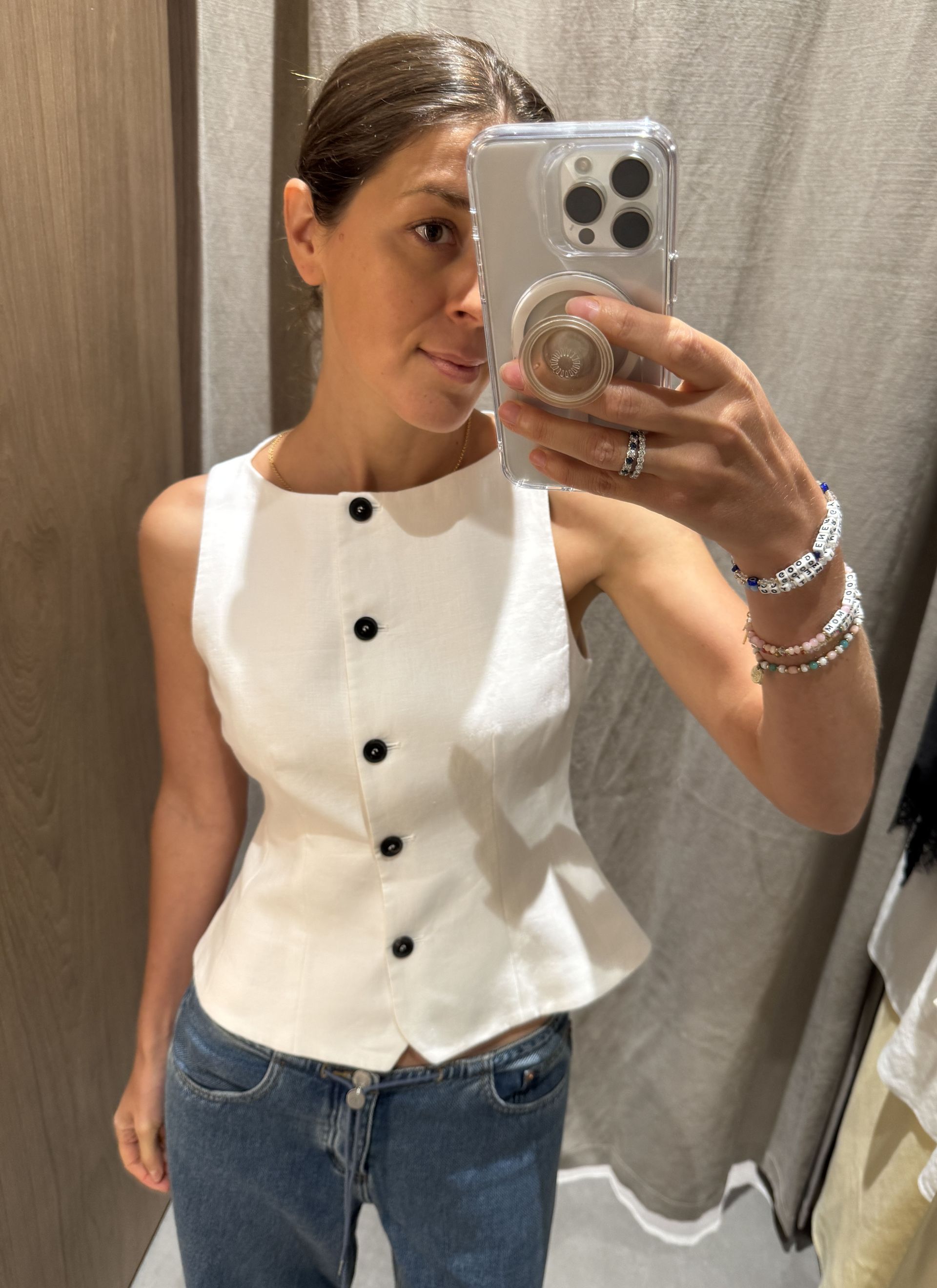 Woman in white linen vest