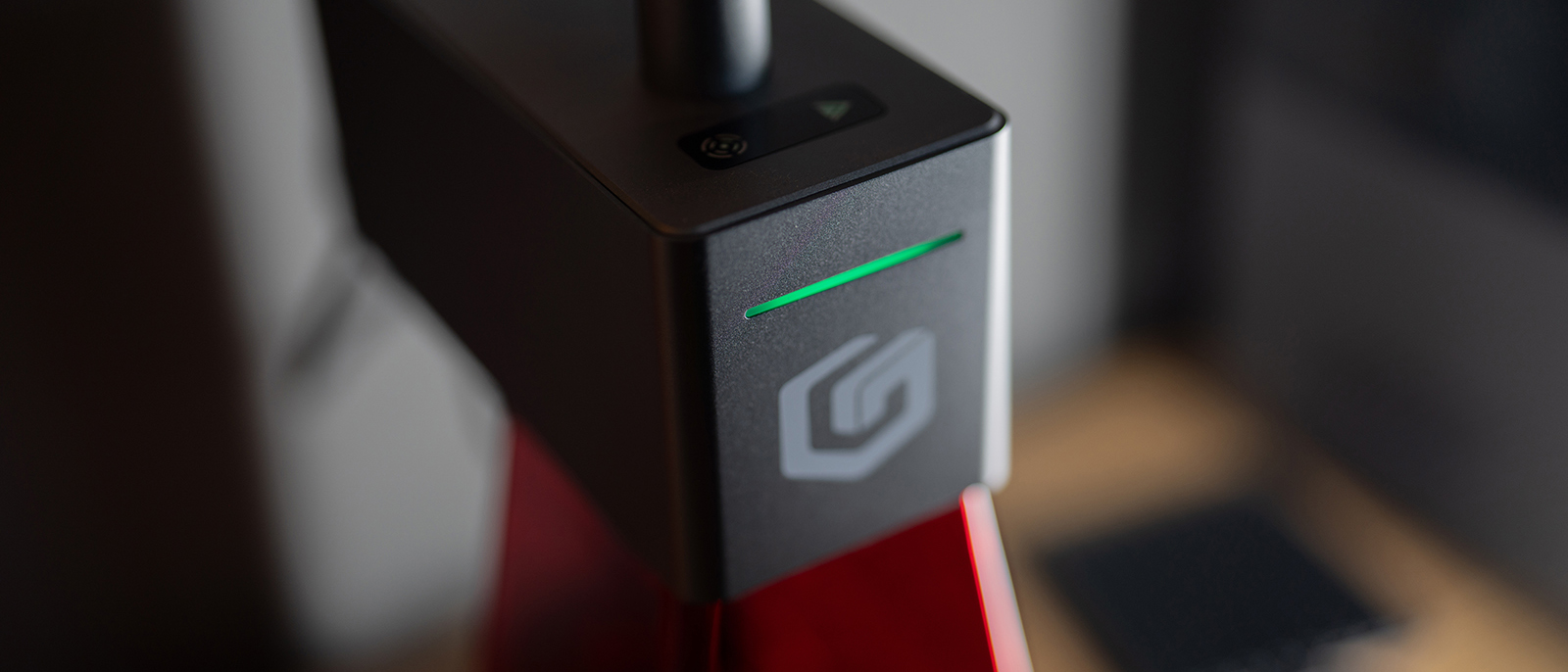 The laser module is compact with a colour coded status LED.